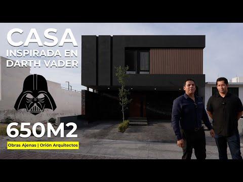 Diseño Innovador de Casa de Cuatro Pisos en Pendiente Inspirada en Darth Vader